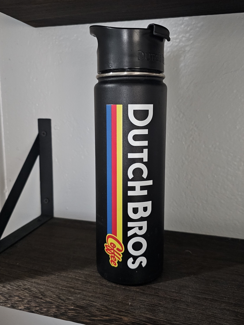 Dutch Bros Matte Black Bottle with Blue, Red & Yellow Stripes